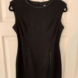 Calvin Klein black work dress with leather trim.
